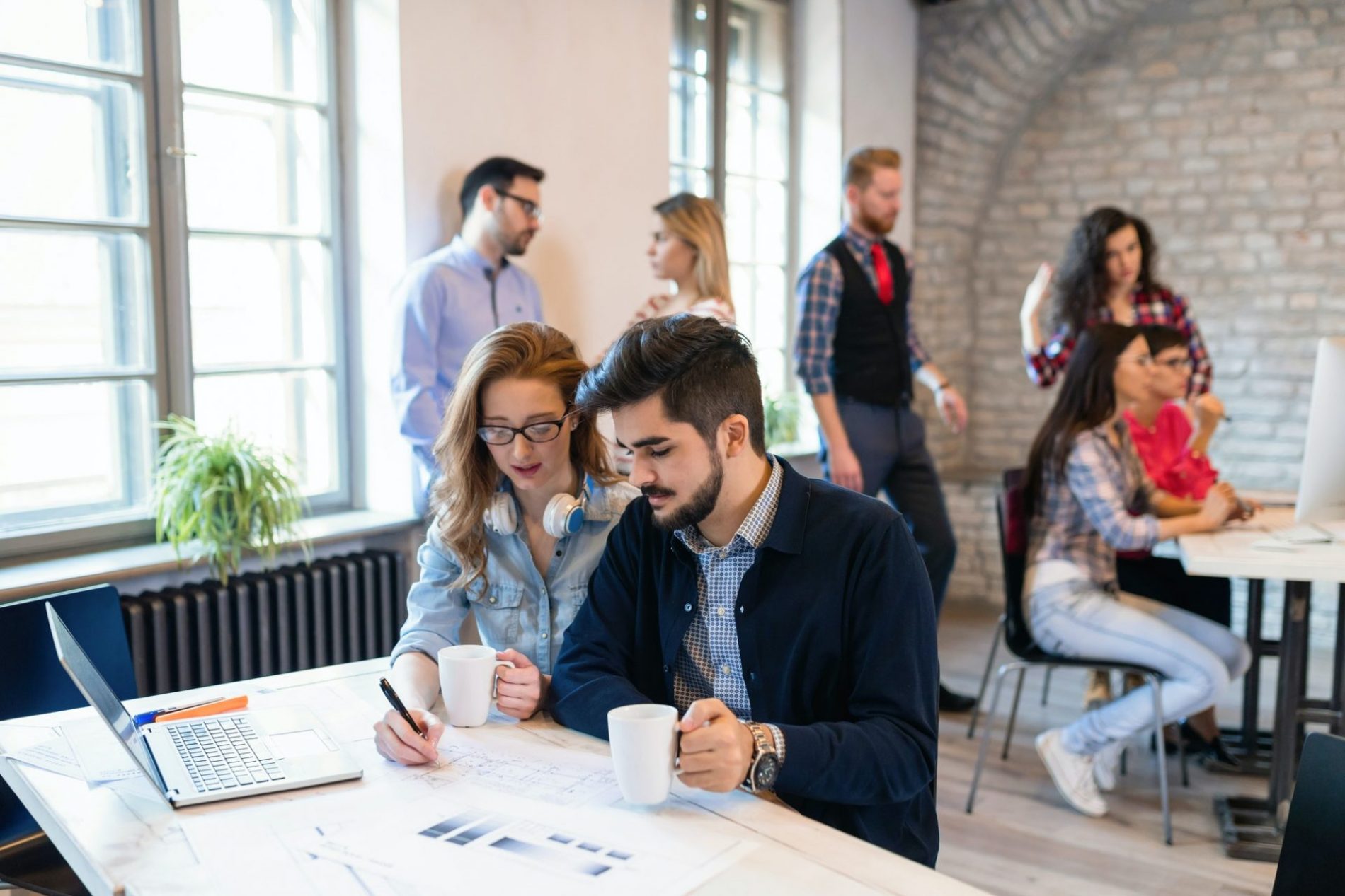 creative coworkers working in office e jpg